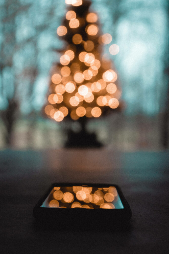 Ethereal Christmas Tree with Soft Focus Lights: Cozy Holiday Aesthetic Wallpaper