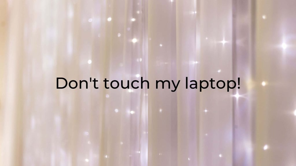 Dreamy sparkling white curtain wallpaper with glowing starburst lights and don't touch laptop text
