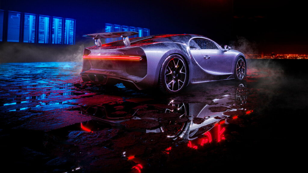 Fluid Power: Artistic Spotlight of the Bugatti Chiron in a Mesmerizing Wet Setting Wallpaper