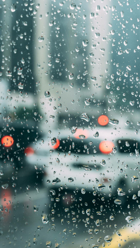 Wet Car Glass: Capturing Rain's Sorrowful Symphony Wallpaper
