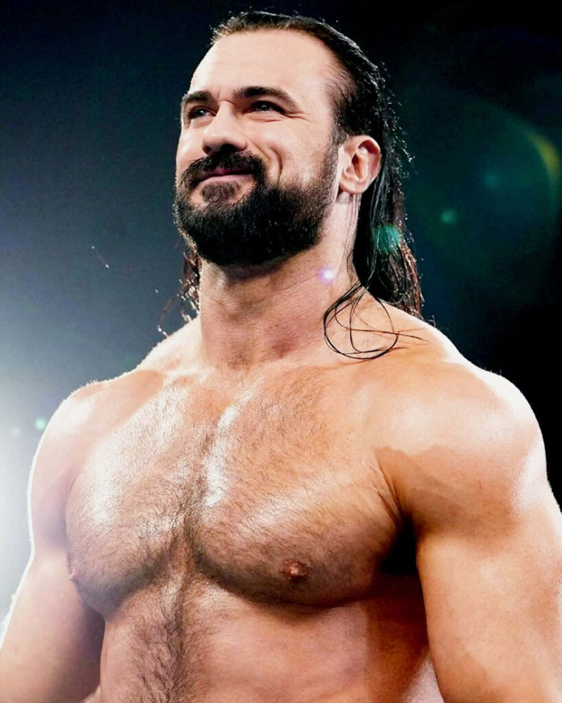 Drew McIntyre wallpaper intense Scottish Psychopath muscular wrestler confident pose background