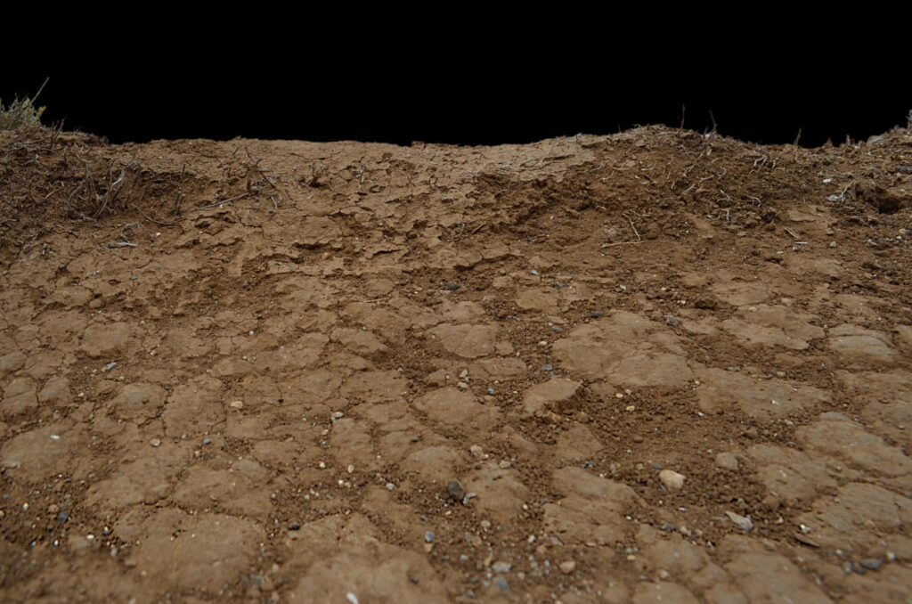 Natural cracked brown soil texture wallpaper dry earth surface rugged arid landscape background