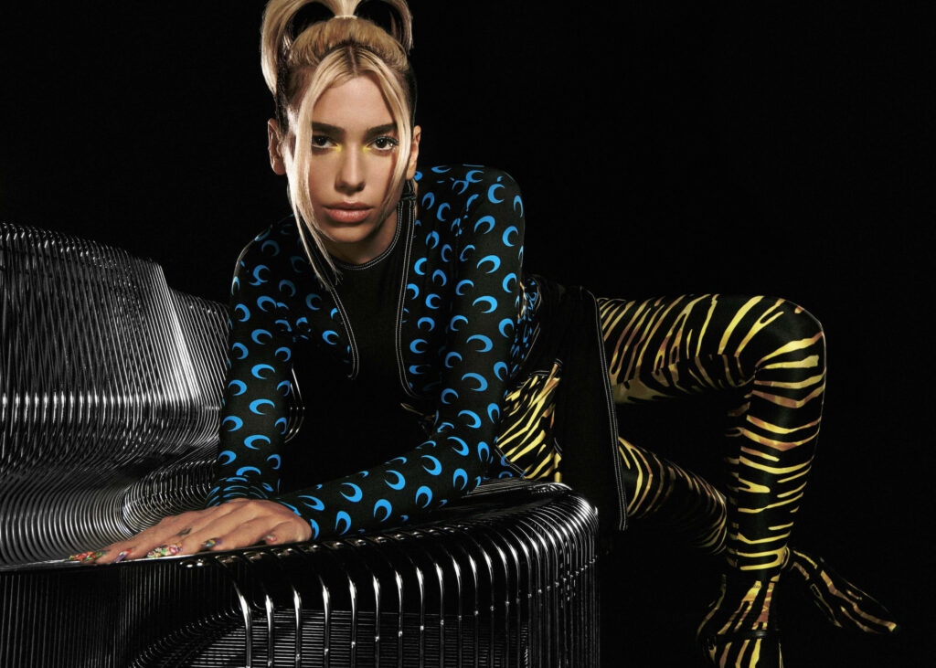 Stunning 4K Dua Lipa Wallpaper: Futuristic Style on Bold Black Background