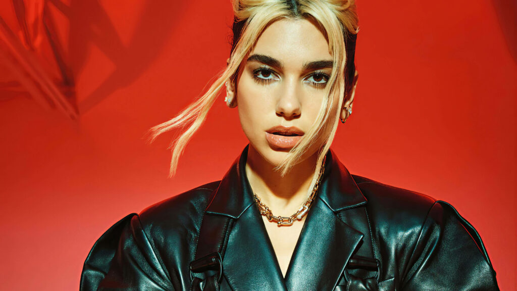 Dua Lipa 4K Wallpaper: Bold Teaser Against Vibrant Red Background