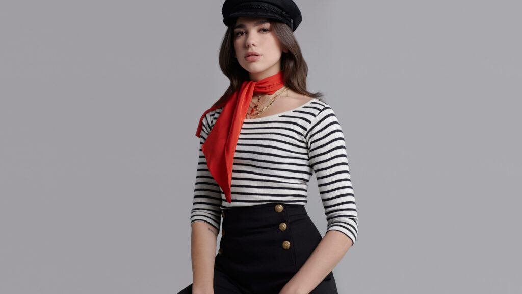 Dua Lipa’s Chic Nautical Look: Stylish Striped Outfit Wallpaper