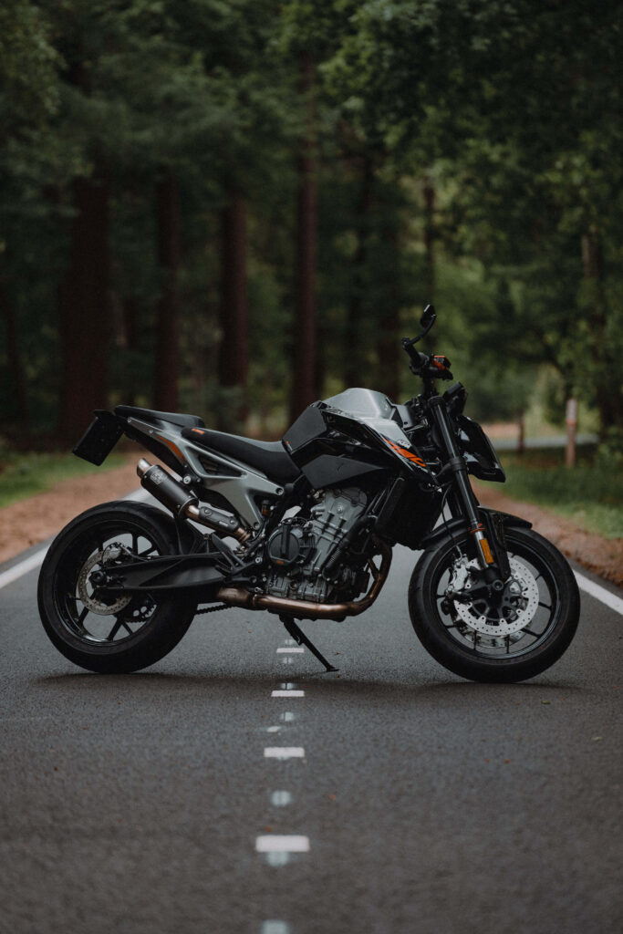 Duke 390 Motorcycle Wallpaper: Adventure on a Forest Road