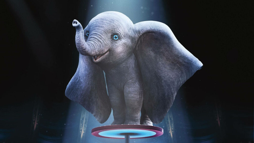 Dumbo on glowing spotlight platform with large ears and expressive eyes circus wallpaper background
