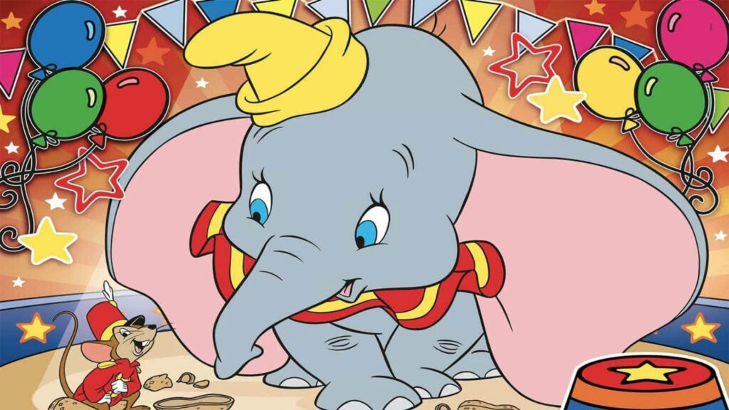 Dumbo with Timothy Q Mouse in colorful circus scene featuring balloons flags and stars wallpaper