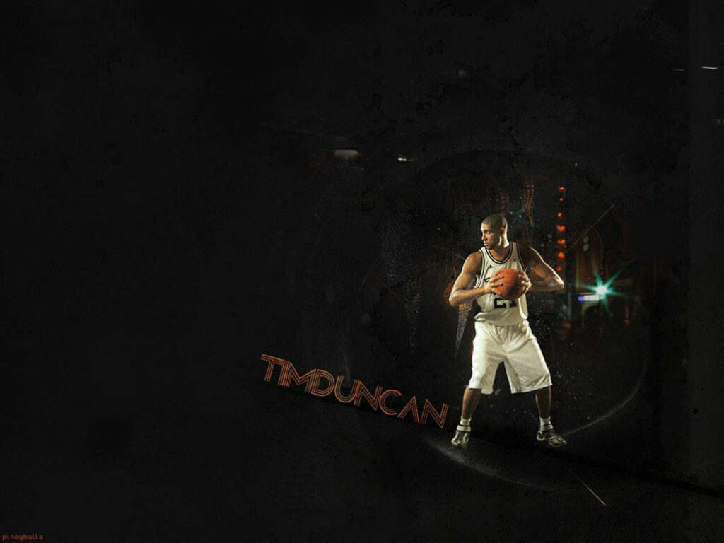 Duncan Dominates: Tim Duncan's Commanding Presence in the Basketball Arena Wallpaper