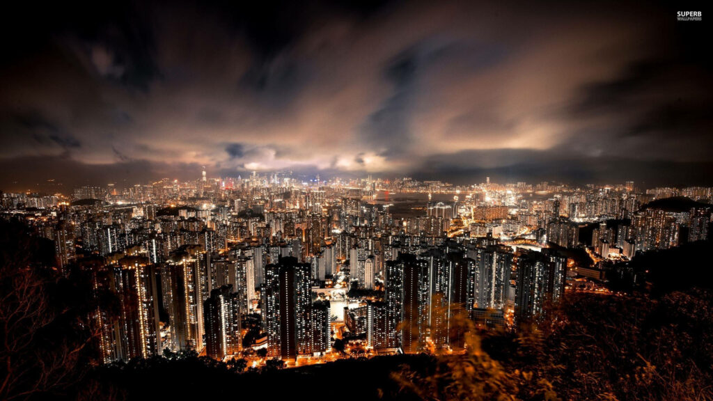 Breathtaking cityscape wallpaper: urban high-rises against moving clouds, dusk