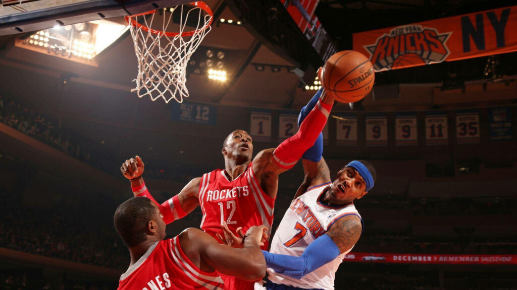 Dwight Howard Houston Rockets powerful slam dunk versus New York Knicks dynamic NBA action wallpaper