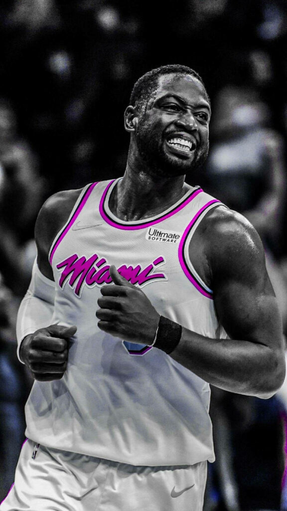 Dwyane Wade mid-motion in Miami Heat white and pink jersey with black and white background wallpaper