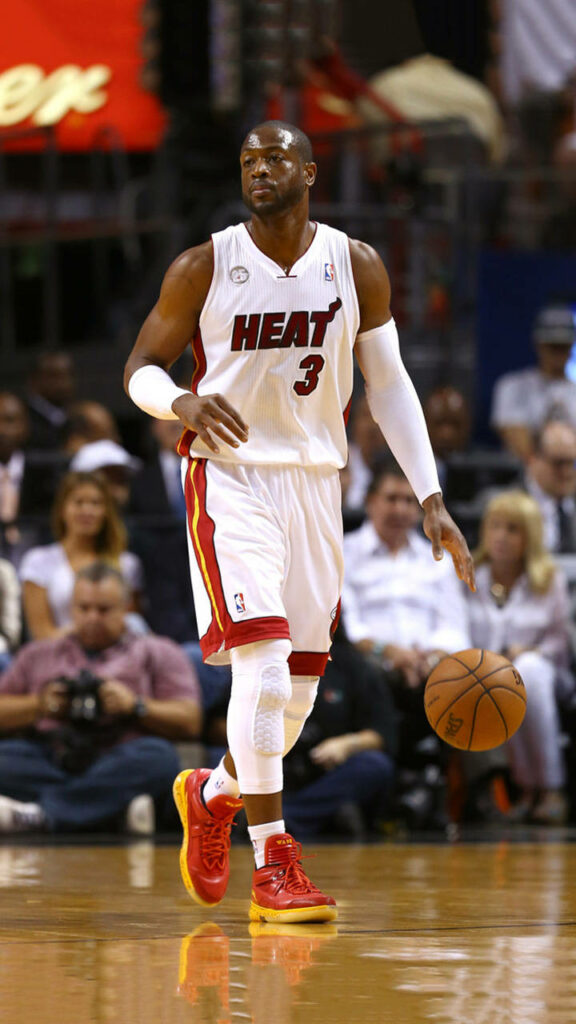 Dwyane Wade Miami Heat NBA Finals action handling basketball intense arena lighting wallpaper