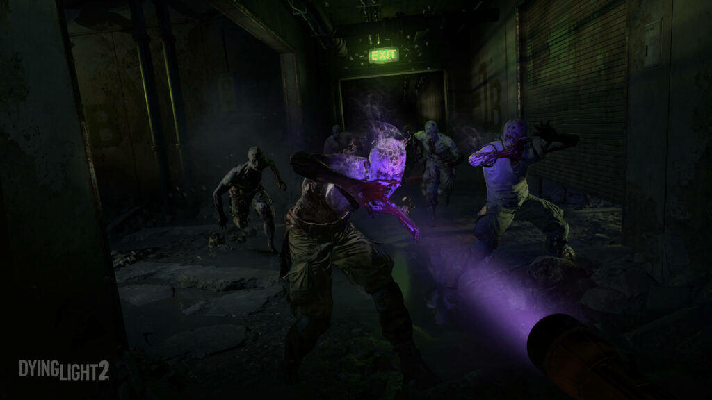 Dying Light 2 infected monsters lunging in dark decayed hallway with eerie ultraviolet flashlight glow Wallpaper