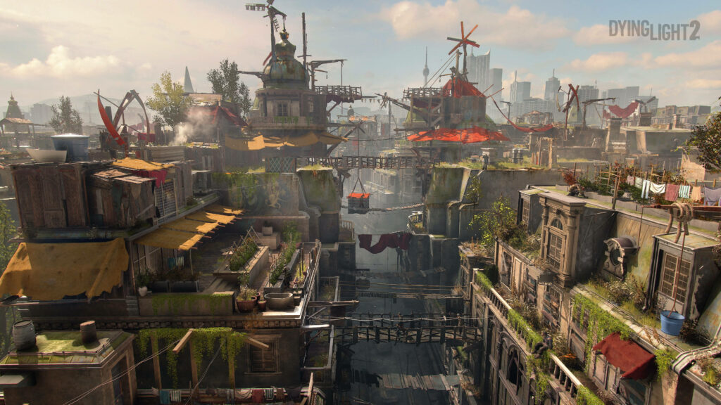 Dying Light 2 rooftop cityscape with vibrant windmills and post-apocalyptic survival environment wallpaper