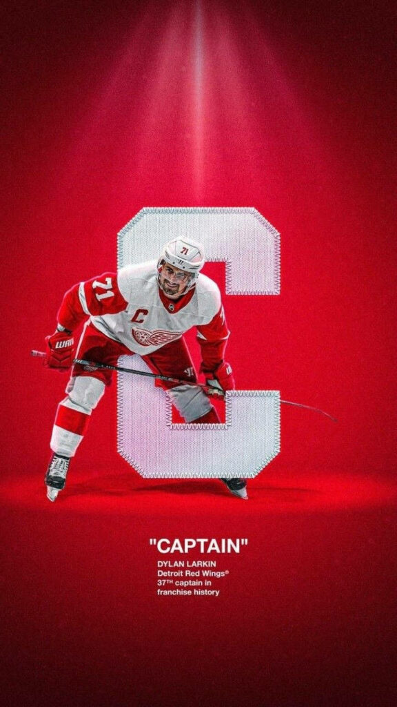 Dylan Larkin Detroit Red Wings captain wallpaper with stitched C emblem on bold red background
