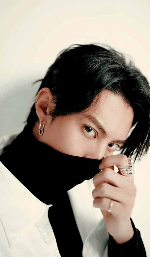 Dylan Wang stylish pose black turtleneck rings earrings modern fashion soft lighting wallpaper