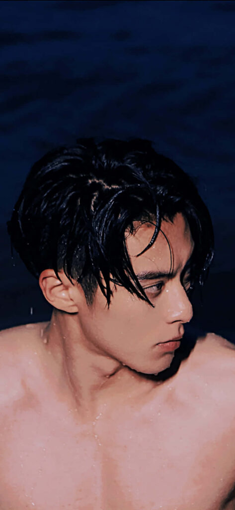Dylan Wang topless with wet hair intense gaze dark moody background cinematic wallpaper close-up