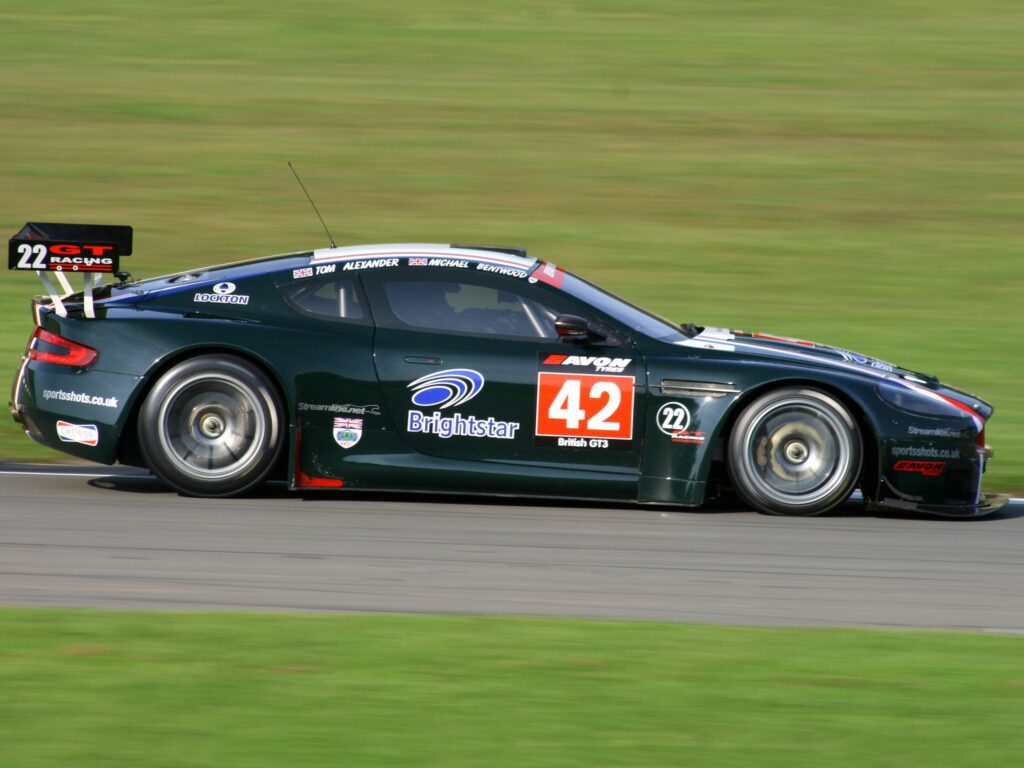 Dynamic 2005 Aston Martin DBR9 Wallpaper - Speed & Style