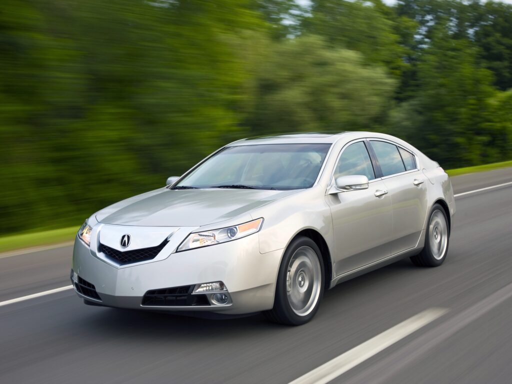 Sleek 2008 Acura TL in Motion: Elegant Silver Metallic Wallpaper
