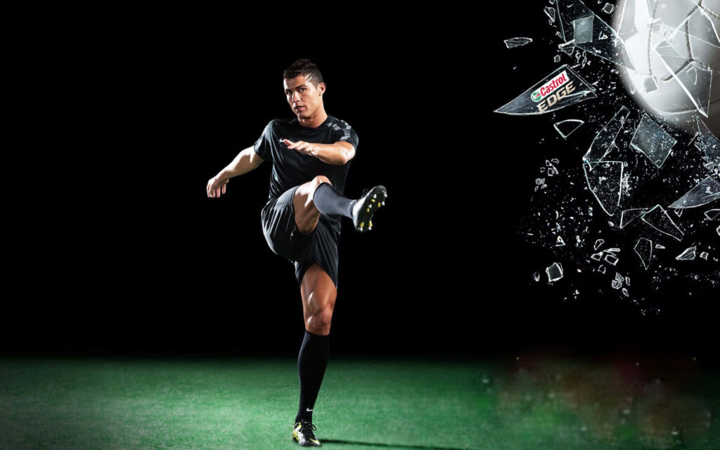 Dynamic 3D Soccer Wallpaper: Player's Kick with Shattering Glass