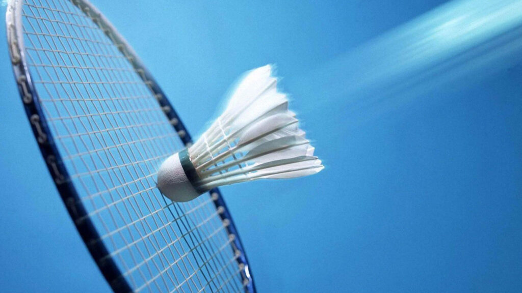 Vibrant 4K Badminton Wallpaper: Shuttlecock & Racket in Motion