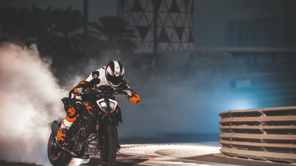 Dynamic KTM Motorcycle Burnout Wallpaper: 4K Action in Smoke
