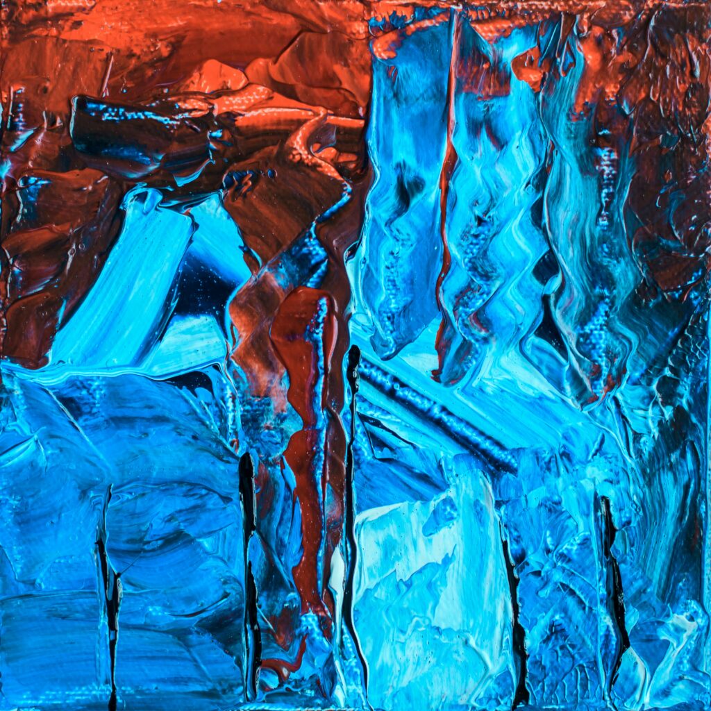 Vibrant Abstract Acrylic Wallpaper: Bold Red & Blue Chaos Background