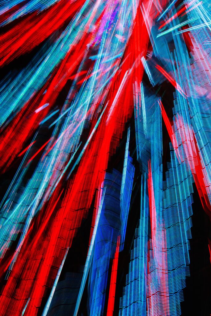 Dynamic Blue and Red Abstract Wallpaper with Intense Energy