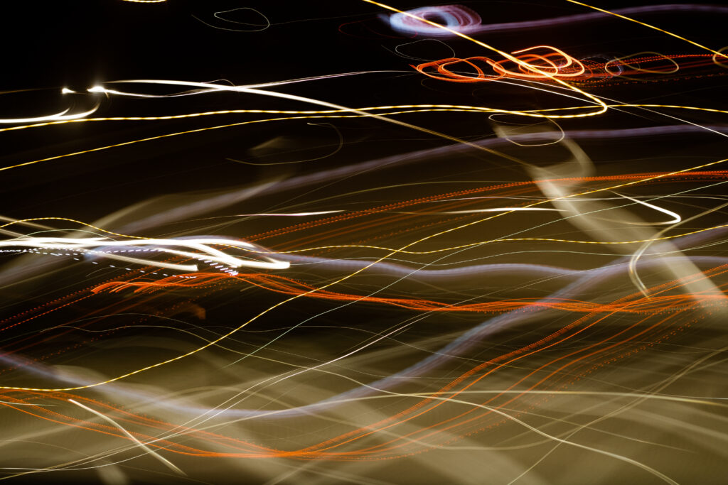 Abstract Colorful Streaks Wallpaper: Dynamic Light & Motion Blur