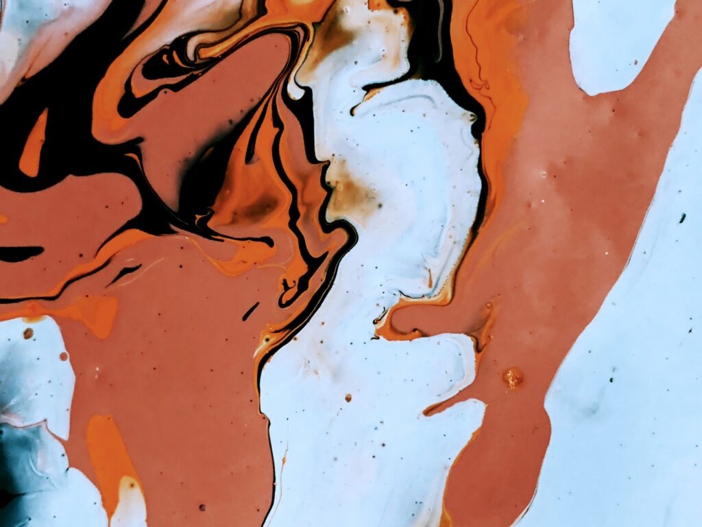 Dynamic Abstract Wallpaper: Brown & Orange Liquid Paint Stains