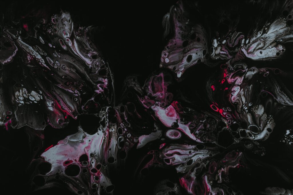 Dynamic Abstract Wallpaper: Fluid Patterns on Dark Background