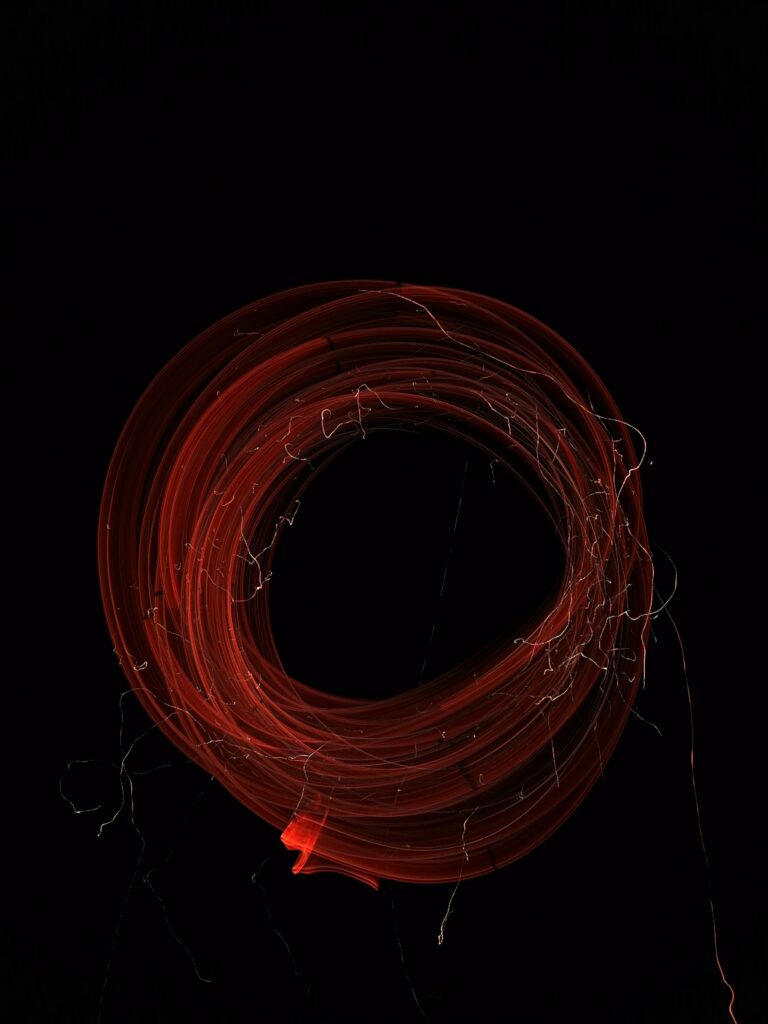 Captivating Abstract Light Swirl Wallpaper | Dynamic Dark Background