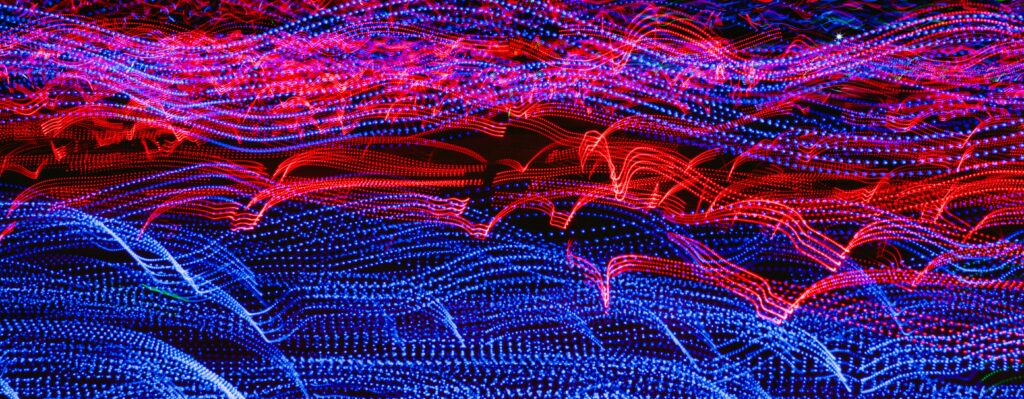 Vivid Red & Blue Wavy Abstract Wallpaper - Dynamic Background Design