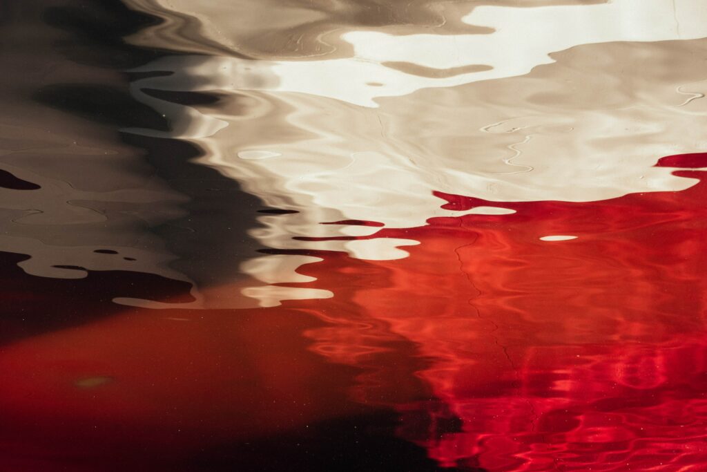 Dynamic Abstract Water Wallpaper with Ripples and Reflections