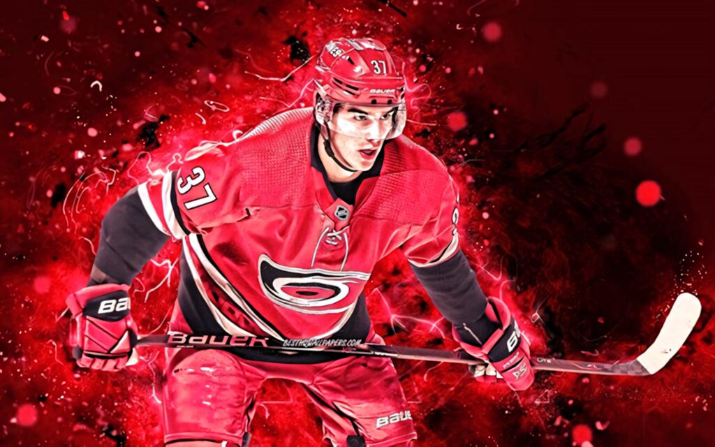 Andrei Svechnikov Carolina Hurricanes poster wallpaper in red uniform with fiery background