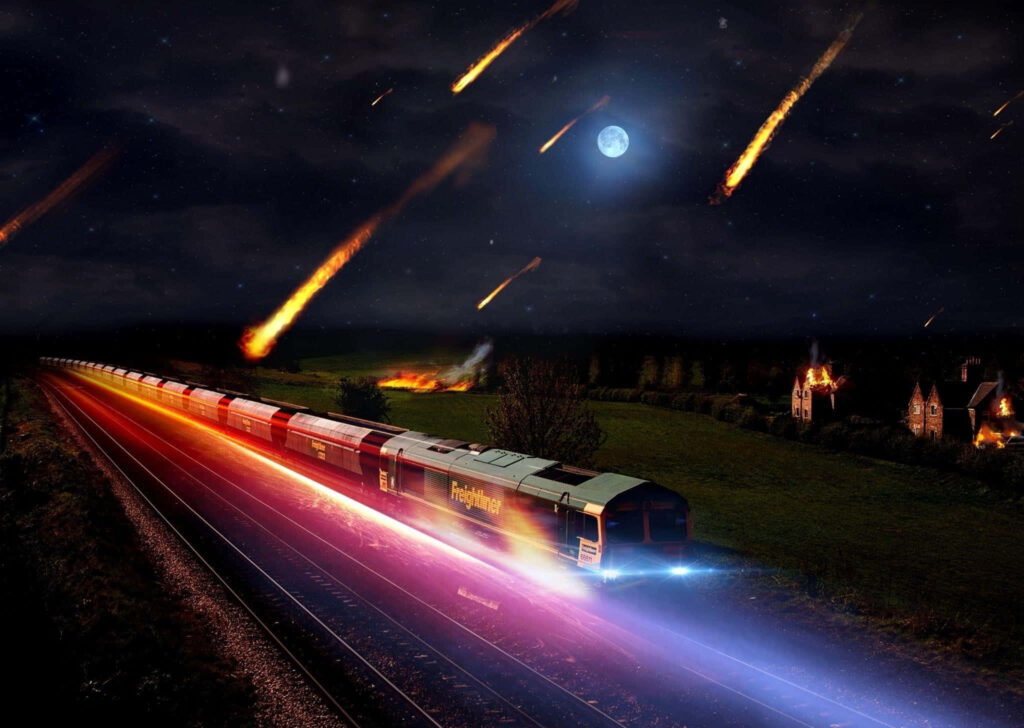 Asteroid Night Sky Wallpaper: Train in Fiery Countryside Scene