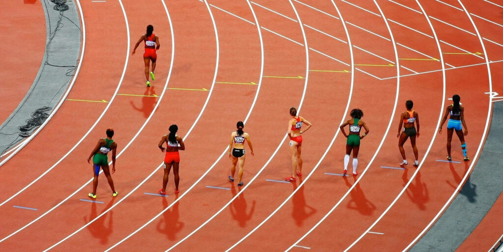 Dynamic Summer Olympics Track Field Wallpaper for Athletes' Energy