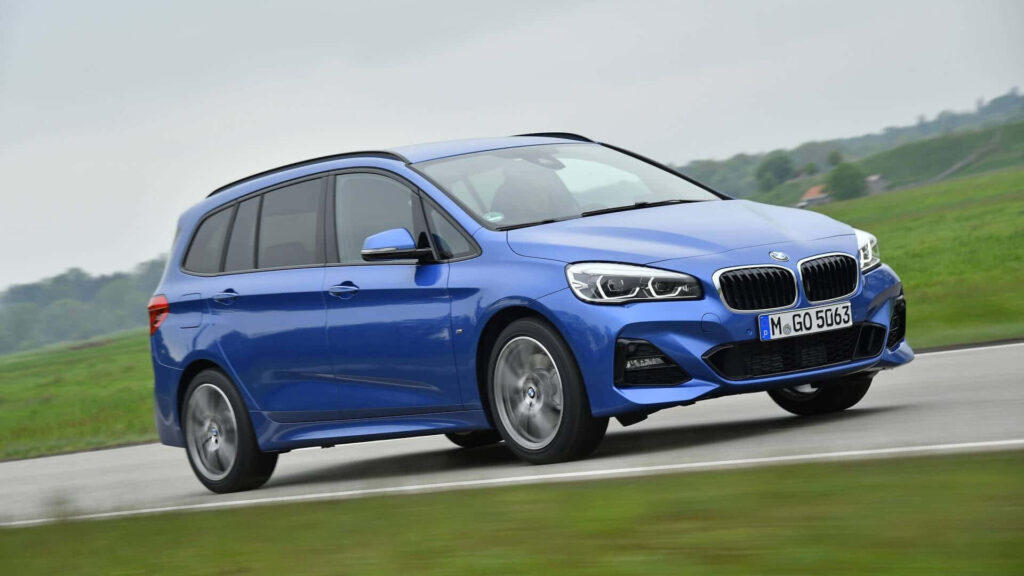 Sleek BMW 2 Series Dynamic Wallpaper: Blue Countryside Cruise