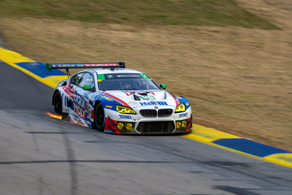 Dynamic BMW M6 Racing Car on Track - High-Resolution Wallpaper