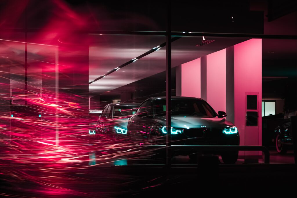 Sleek BMW Wallpaper: Vibrant Lights & Color Trails Background