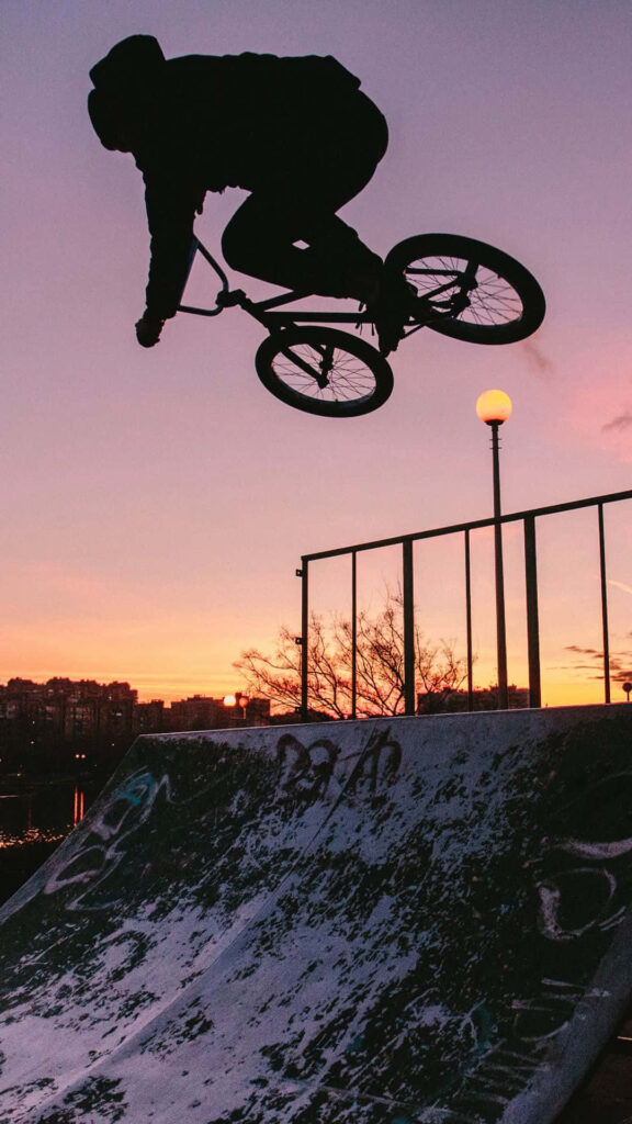 Stunning BMX Biker Silhouette Sunset Phone Wallpaper Background