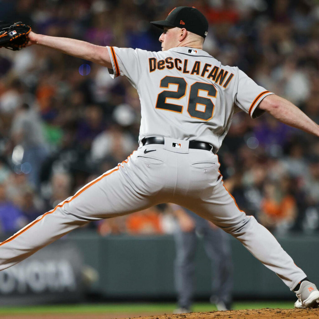 Dynamic Wallpaper of Anthony DeSclafani's Powerful Pitching Stride
