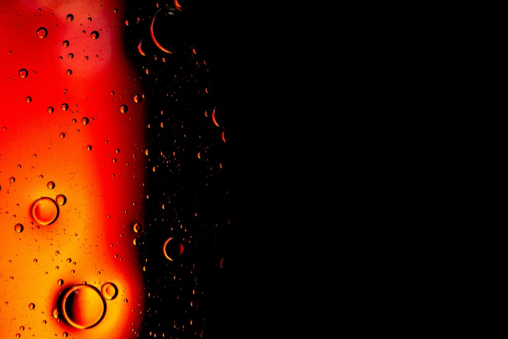 Dynamic Red & Orange Gradient Wallpaper on Dark Background