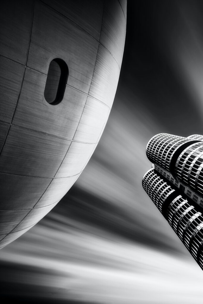 Dynamic Black and White Wallpaper: Curved Facade & Modern Skyscrapers