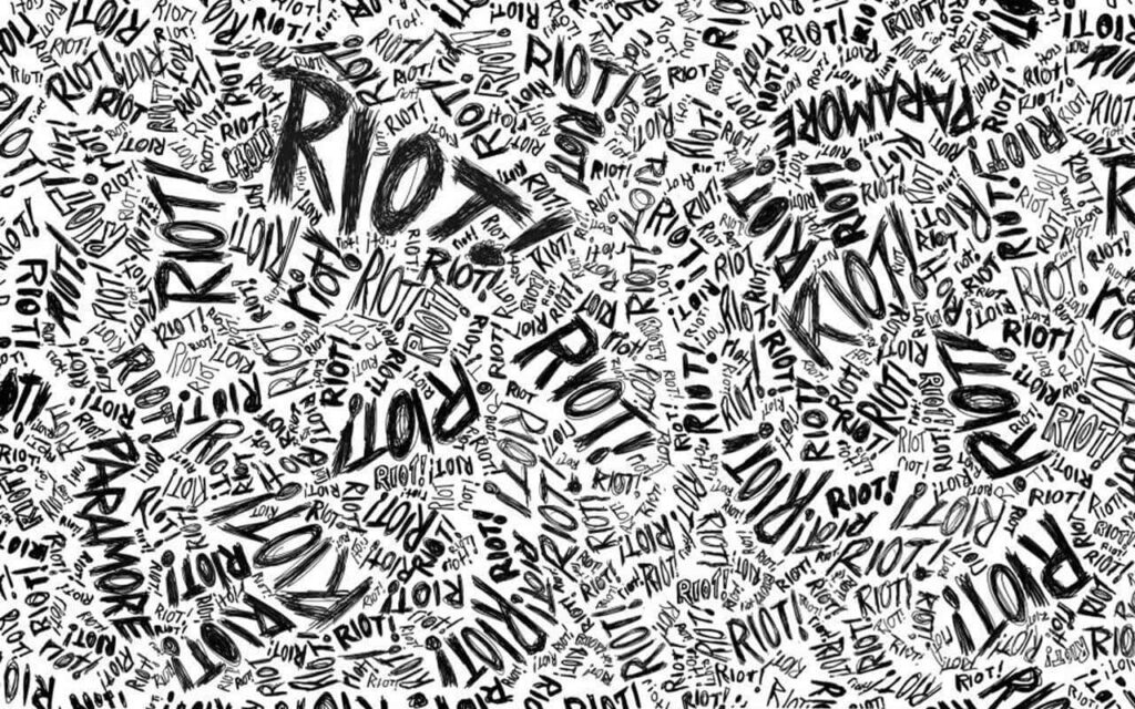 Dynamic Black and White Wallpaper with Energetic Riot! Typography