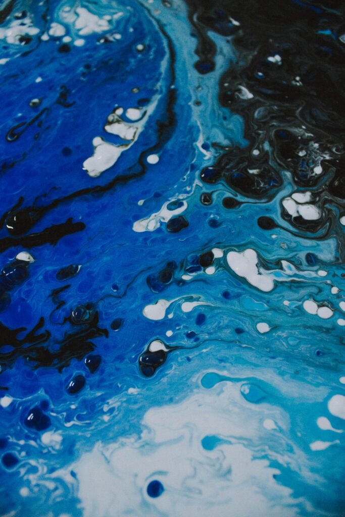 Dynamic Blue and Black Abstract Wallpaper - Vibrant Artistic Background