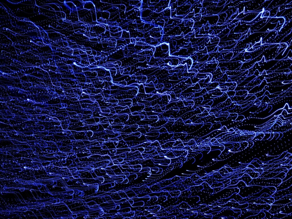 High-Res Abstract Blue Light Wallpaper - Dynamic Dark Background