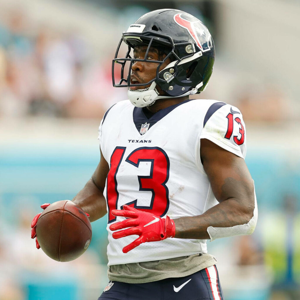 Brandin Cooks Houston Texans football player in white red uniform running with ball in stadium Wallpaper