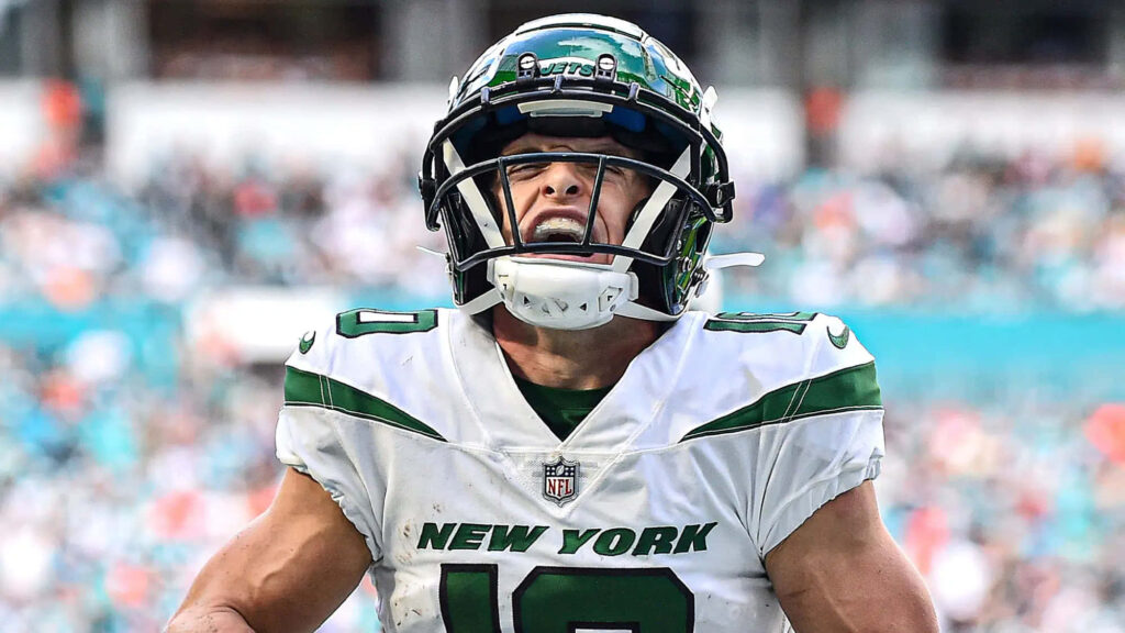 Braxton Berrios New York Jets intense football action vibrant team colors dynamic wallpaper